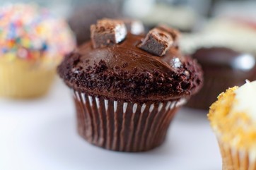 Decorated cupcakes on counter